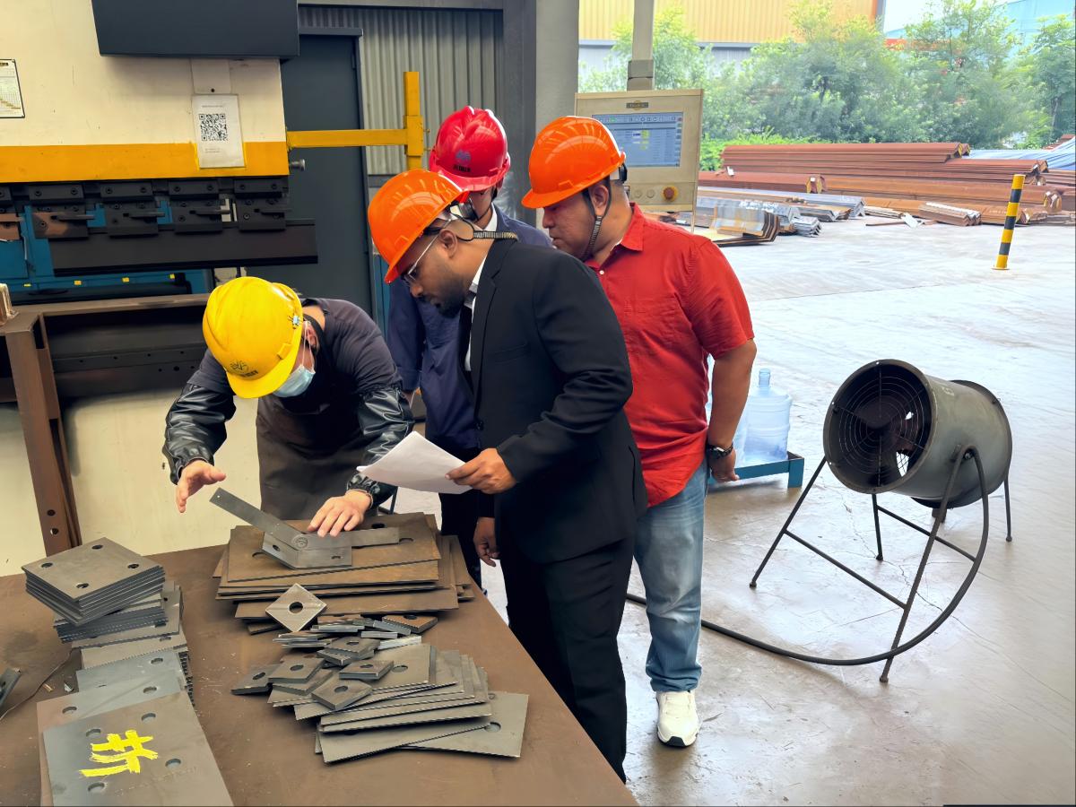 Client from United Arab Emirates Factory Visit-1: Angle Steel Tower Production