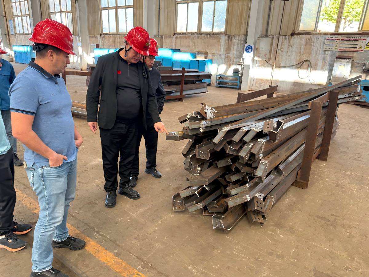Venezuelan Clients Visit Our Production Lines for Angle Steel and Tubular Towers